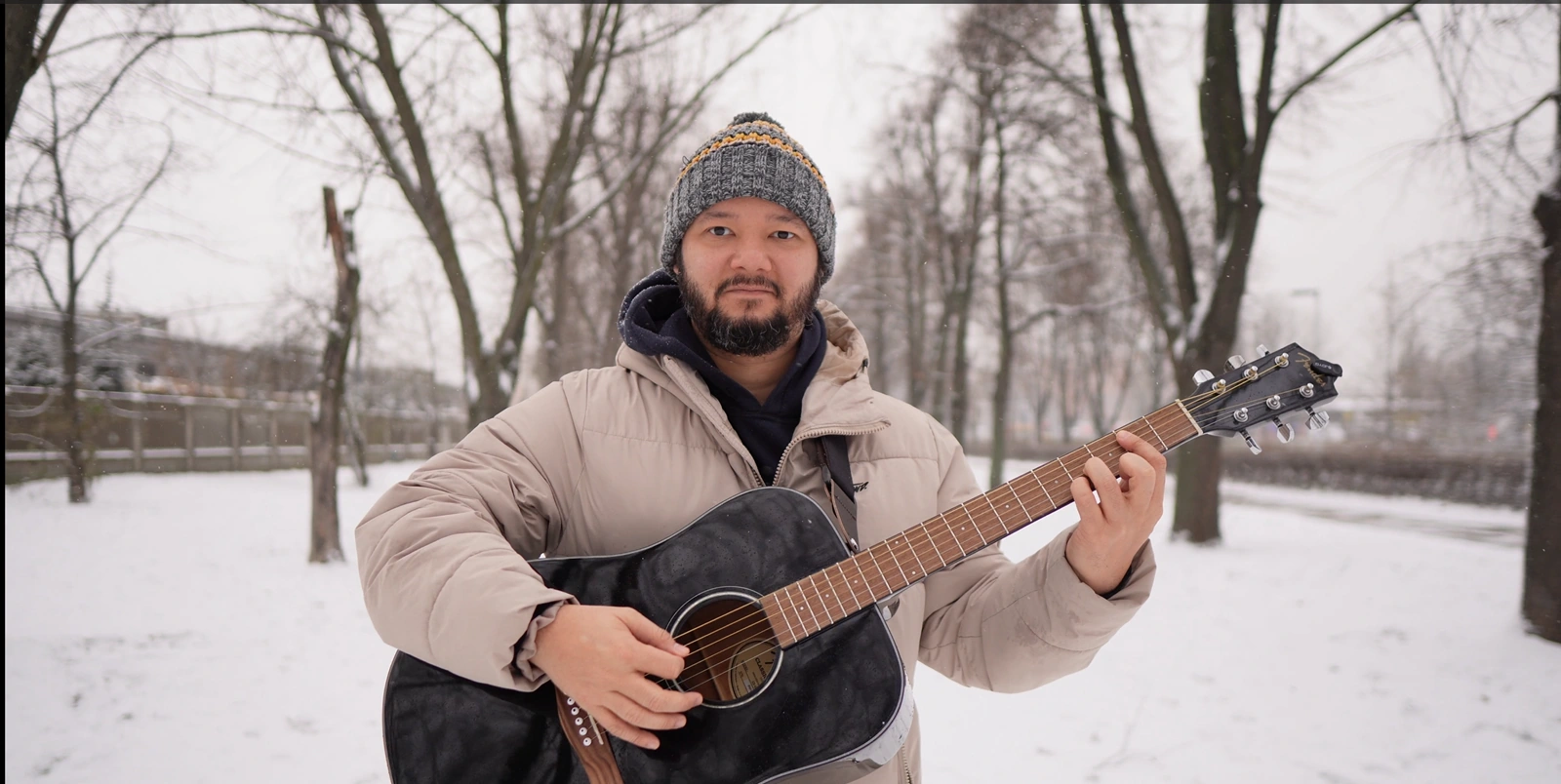 Winter acoustic guitar performance